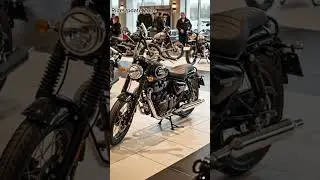 New 2026 Royal Enfield Super Meteor 650 Bobber in White Luxury Showroom | High Resolution Bike Image