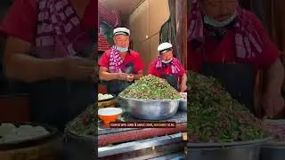 Chinese street food - Halal steamed bao buns with lamb & garlic chive filling #streetfood #foodlover