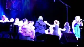 Misha Lambert leads Desert Arc choir