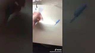 Guy makes a weapon out of a pen in office