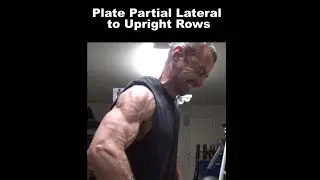 This weird plate upright row exercise will build side delts and upper traps