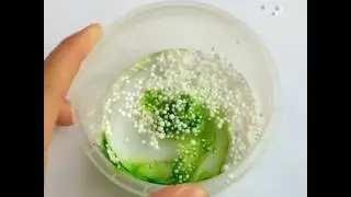 MIXING FOAM AND FOOD COLORING INTO SLIME