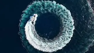 top down drone shot of luxury yacht driving Stock Video Free