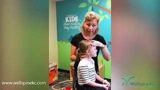 Overland Park Chiropractor Demonstrates the Ease of Adjusting a Kiddo!