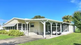 704 Barefoot Boulevard, Barefoot Bay, FL Presented by Robin Burgarella.