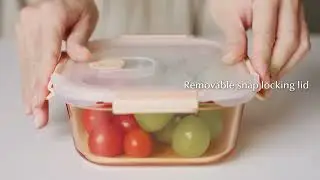 Colored glass food container with snap locking lid