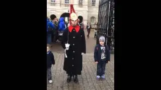 Charlie smacking the queens guards bum
