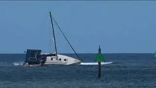 Boat that ran aground remains at Agat Marina