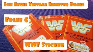 I'm opening vintage booster packs containing 6 WWF stickers from Merlin World Wrestling Federation