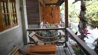 Entering room 106 at the Zawgi Inn, Nyaung Shwe, Myanmar