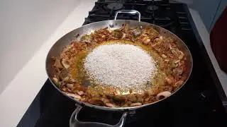 Arroz con alcachofas y calamares