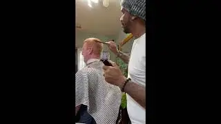 Mans clipper over comb haircut