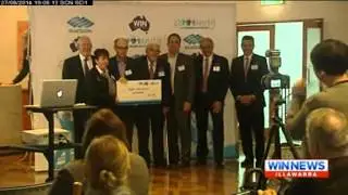BlueScopeWIN Cheque Handover WIN News 27 August 2014