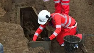 Skeletons unearthed in giant UK train line excavation