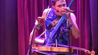 attempting to play cello, viola, guitar & kazoo at the same time (quadruple failure)