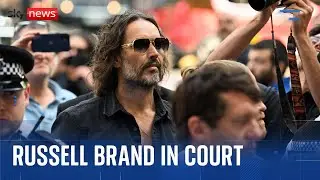 Russell Brand arrives at court to face rape and sex assault charges