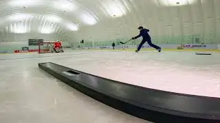 The Hockey Rebounder Redefined: Portable, Lightweight, and Professional -- Norge Eik BeamPasser
