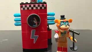 FNaF Freddy with charging station set. #fivenightsatfreddys #phatmojo￼ #securitybreach #lego 