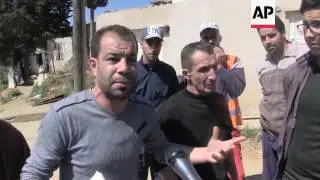 Residents moved as improvised homes are demolished