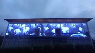Front view plaza side transparent LED screen display for facade building