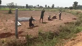 Farmland fencing with granite stones and TATA mesh