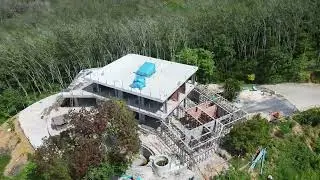 drone vidoe of house on a mountain
