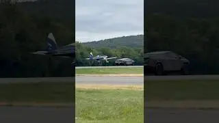 Tesla CyberTruck races 1951 DHC-1 Chippy at Air Dot Show New York