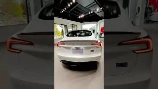 Tesla Model 3 Performance 2025 | Sleek Pearl White MultiCoat | Exterior Rear View