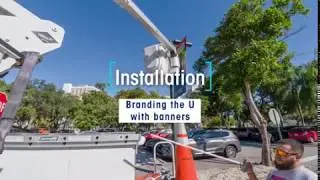 Installation of light pole banners at the University of Miami