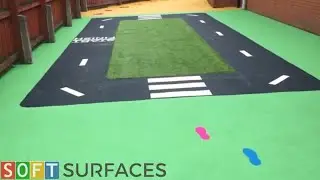 Rubber Playground Flooring With Artificial Grass in Worthing, West Sussex | Wetpour Play Area