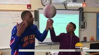 &lsquo;Handshake teacher&rsquo; Barry White Jr  teams with Harlem Globetrotter to delight kids