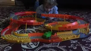 Gabriel Playing with KNex cars