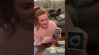 Girl gets super excited opening up Pok&eacute;mon cards!
