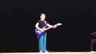 Isabel playing guitar at Sunset Valley talent show. 11-17-2016