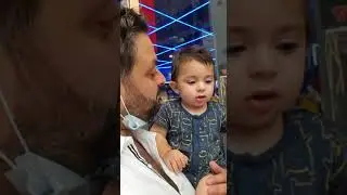 Teasing a baby with food
