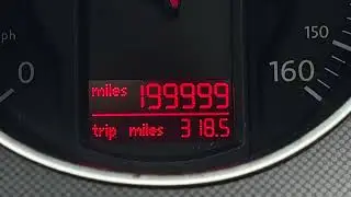 2007 VW Passat rolling 200,000 miles on odometer with fun soundtrack.
