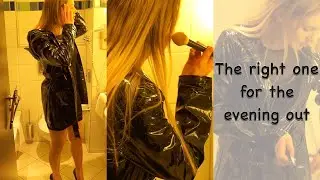 Blonde party girl in black shiny raincoat - vinyl raincoat, lackmantel, rainwear, shiny fashion