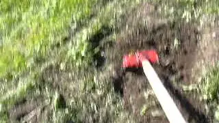 Glaser Hula Hoe/Stirrup Hoe in Use in Garden