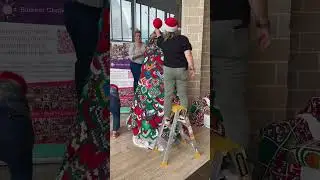 Christmas tree decorated with crocheted granny squares