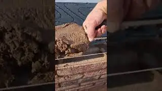 Spreading mortar on bricks. #asmr #brick #brickbuilder #tips