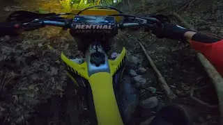 Suzuki RMX450Z on technical single track