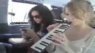 Taylor Swift playing with the flute 