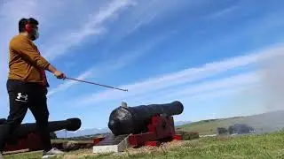 Andrew Lu firing a 9 pounder muzzle loading cannon