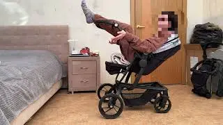 Fat girl in a babyton spider stroller