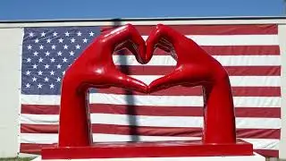 Hands Making Heart American Flag Art Sunset Blvd Beverly Hills California USA March 9, 2025