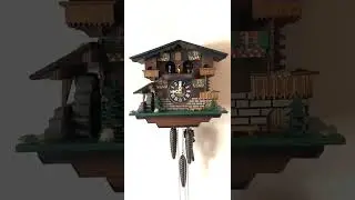 1984 waterwheel chalet cuckoo clock. Plays Die Muhle im Schwarzwald & Holzenhackerbub&rsquo;n Marsch.