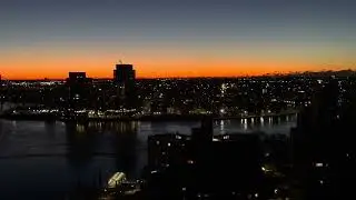 Dawn sky from NYC Upper East Side. Manhattan, Queens,  Robert F. Kennedy (Triborough) Bridge.