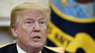Trump blocks release of Democratic memo on Russia probe