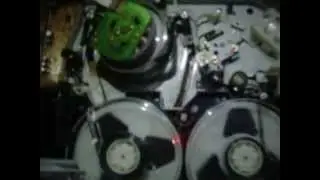 Coverless VHS and tape while playing into VCR SP speed...