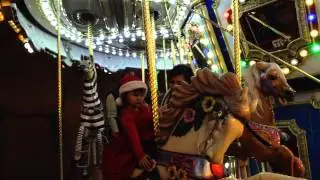 Kayla on the carousel at circus circus
